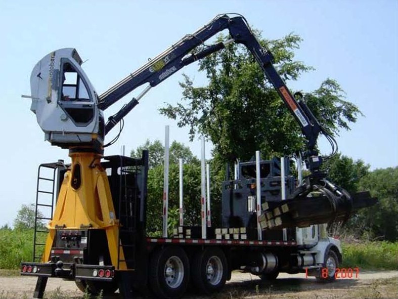 Elite XT with Rail Tie Grapple Attachment.jpg